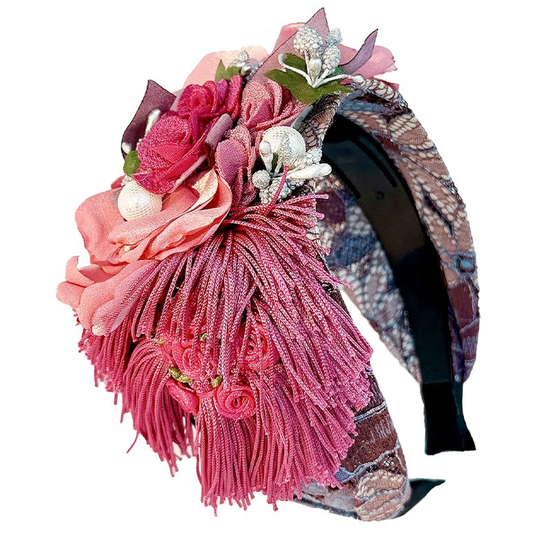 Layered pink fabric flowers with romantic bead details