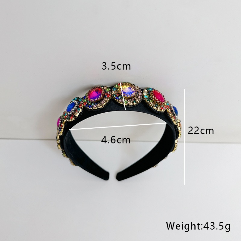 Wide headband shown beside measurement markings
