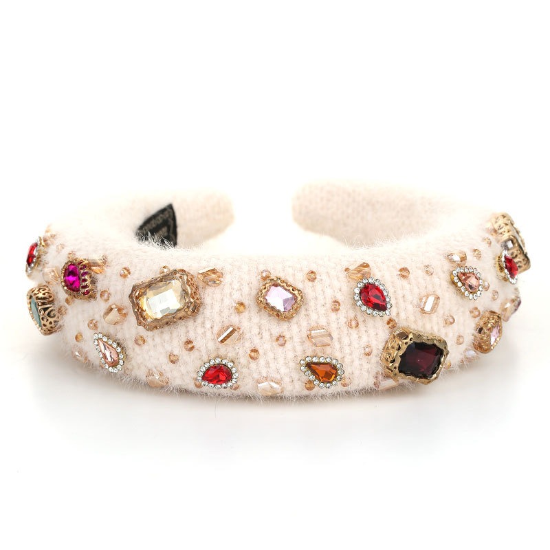 Ivory wide padded hoop showing plush shape and volume