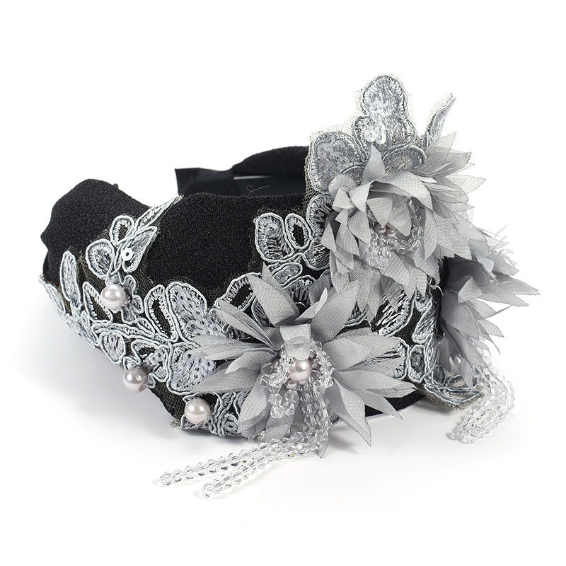 Raised mesh flowers and embroidered lace on black headband