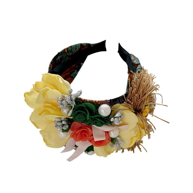 Yellow coral headband with flowing gold tassel fringe