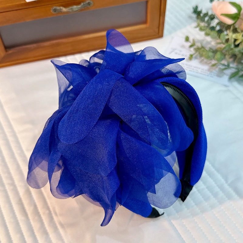 Blue flower headband with structured covered base