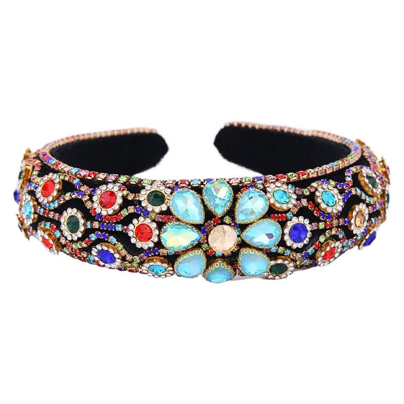 Colorful faceted floral stones across black headband