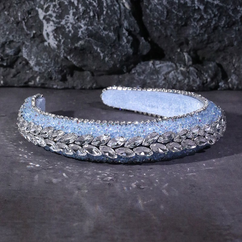 Icy blue headband with layered leaf-shaped stones