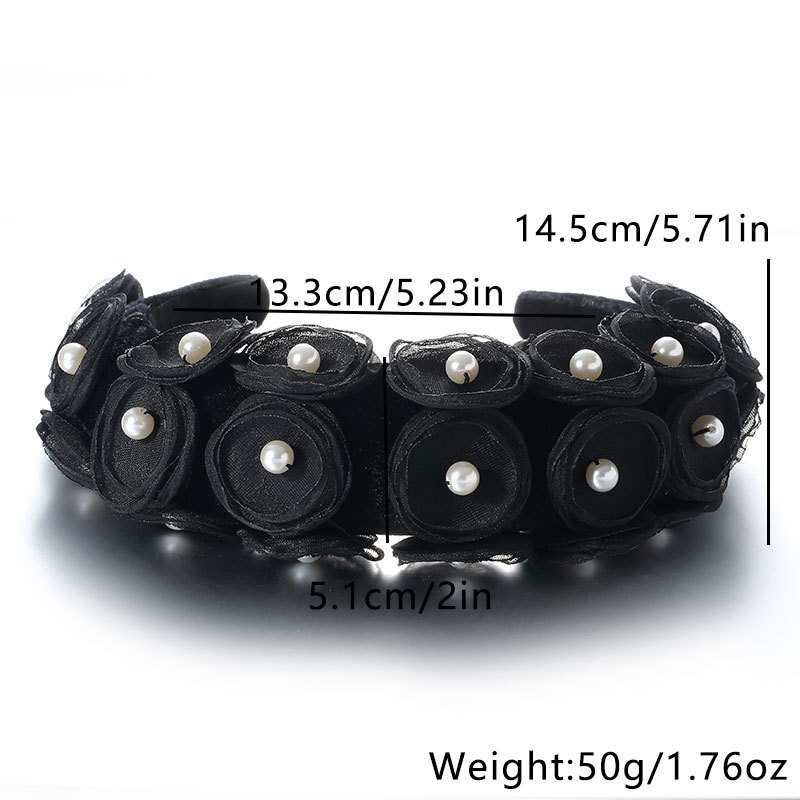 Full black headband showing layered flower arrangement