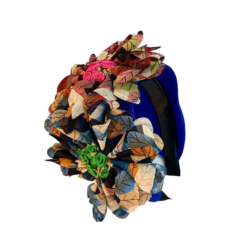 Layered patterned fabric petals on colorful floral hoop