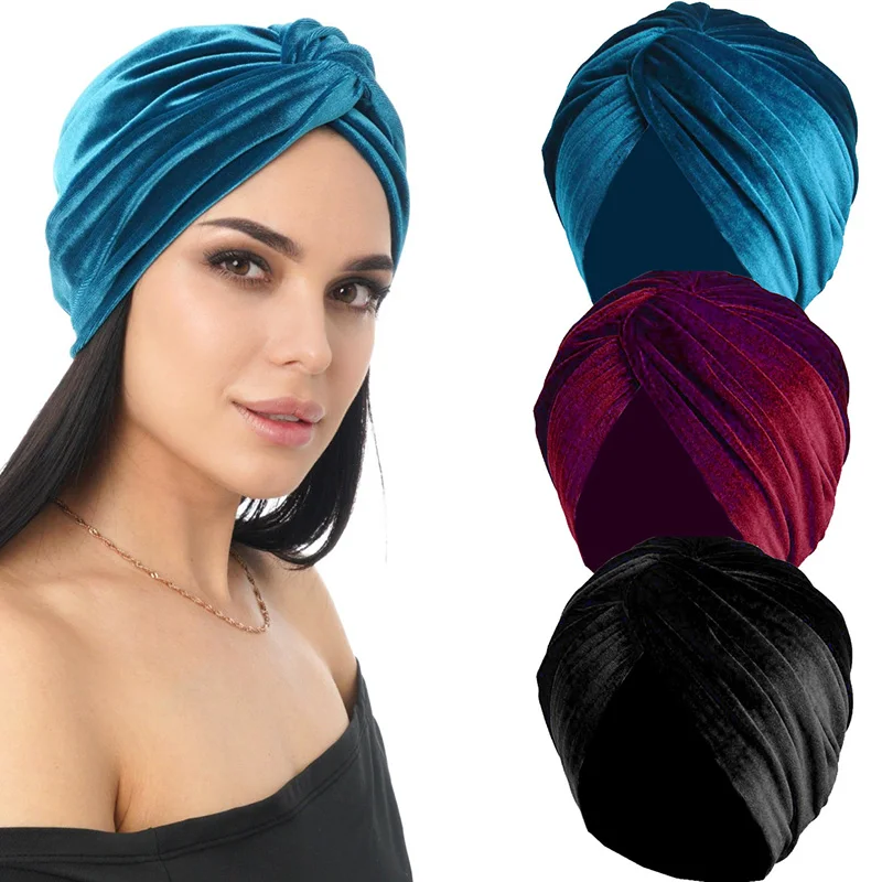 Teal turban model showing full head coverage