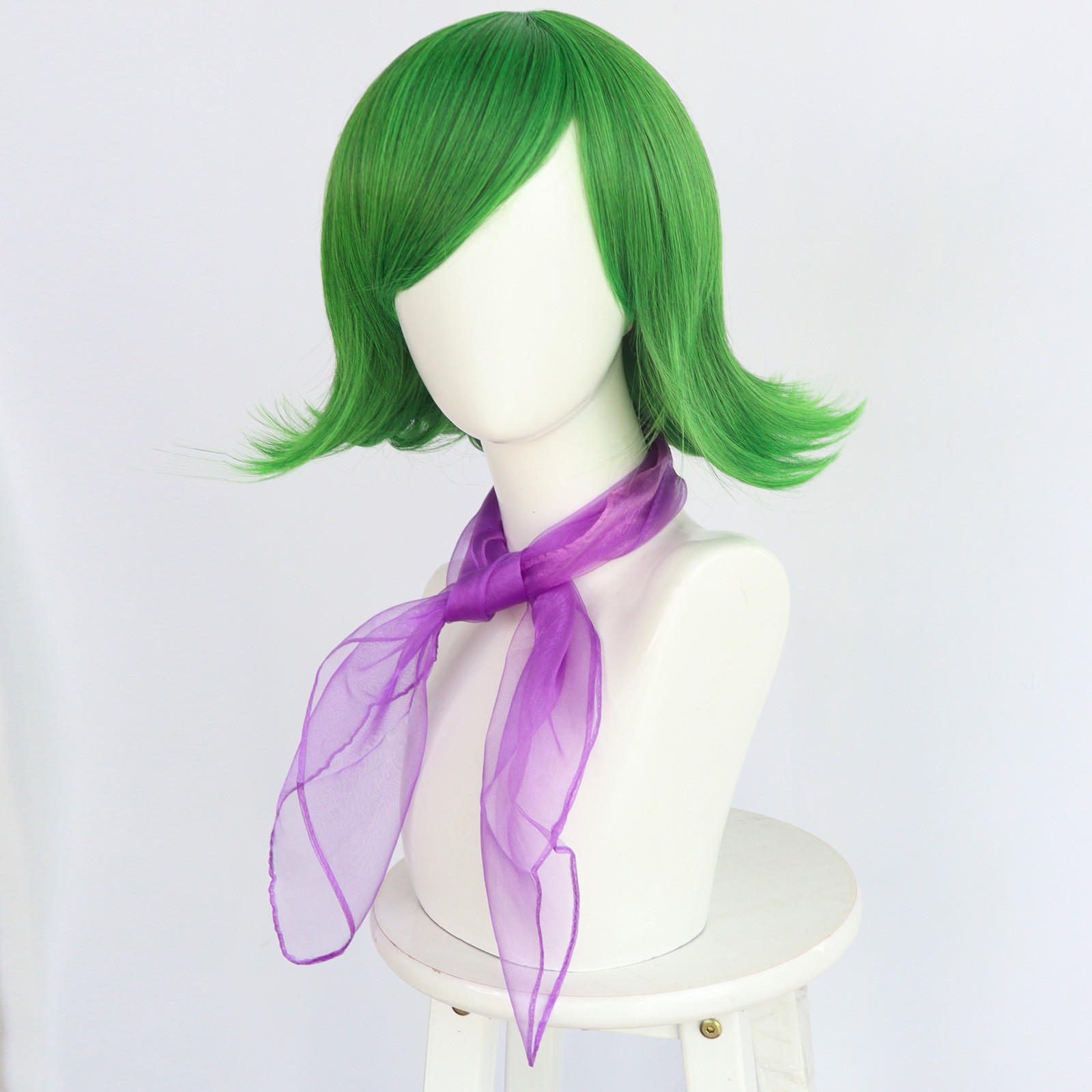 Three-quarter view of green cosplay wig and scarf