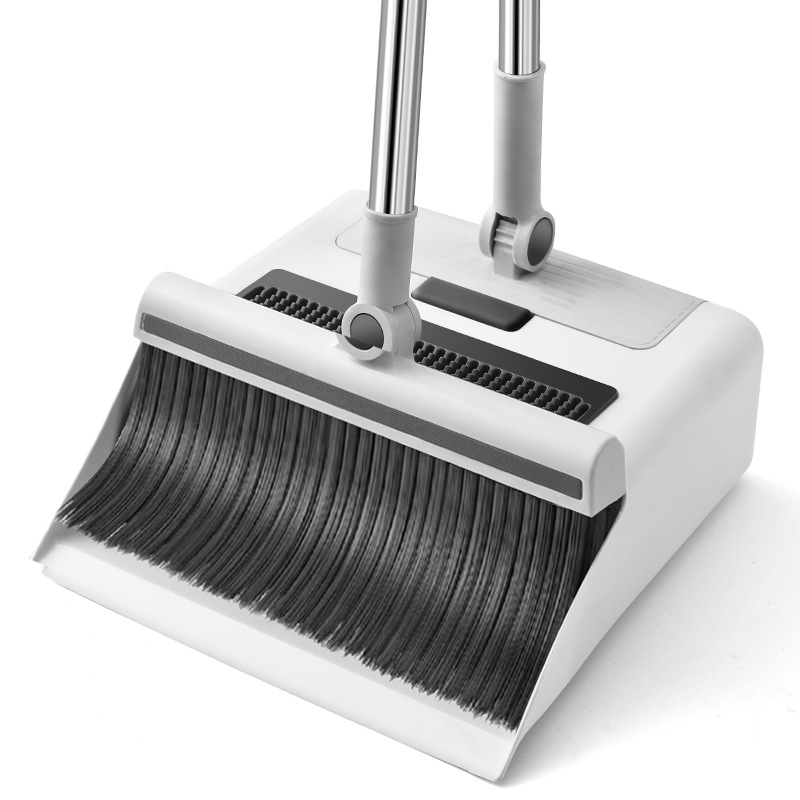 Button deployment of integrated dustpan one-handed
