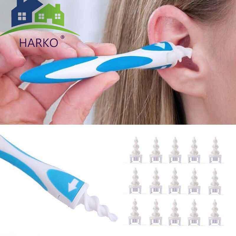 Woman comfortably using the ear cleaner at her ear with HARKO branding visible, showing real-world ease