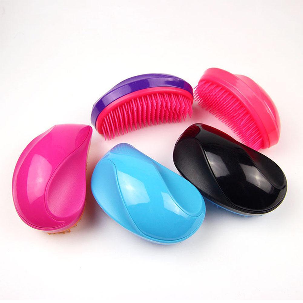 Curved glossy brush shell shown from multiple angles