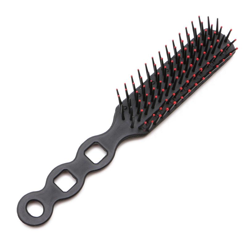 Wide paddle head with dense flexible bristles