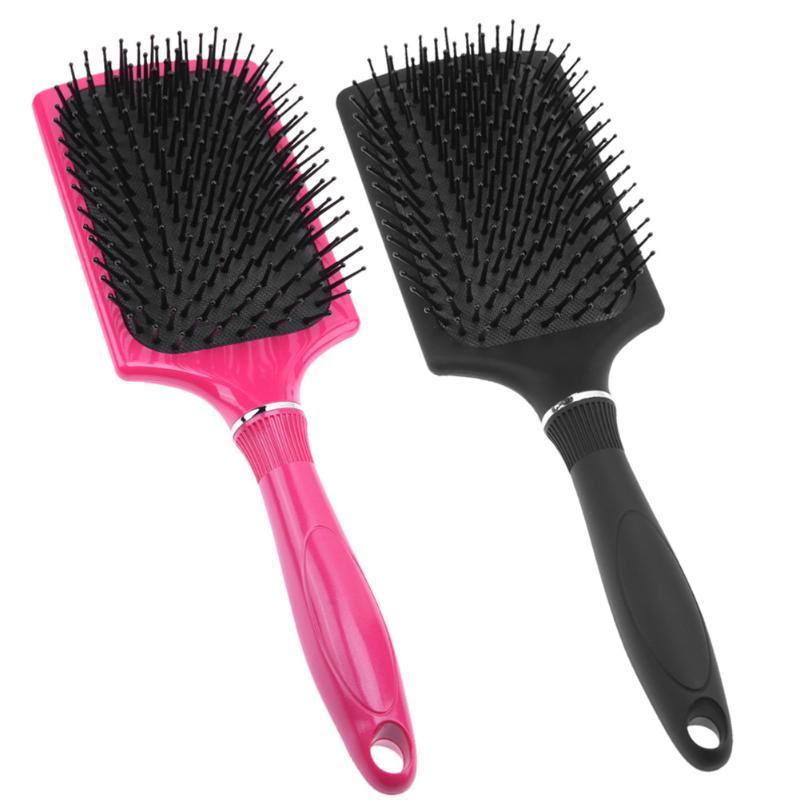 Pink and black wide paddle brushes side by side