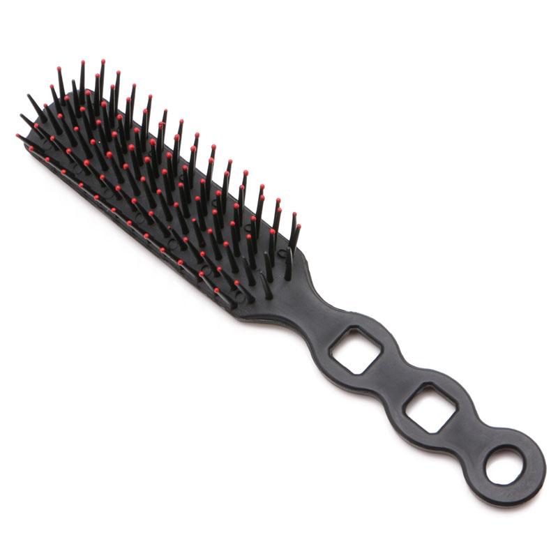 Rounded red tips on flexible paddle brush
