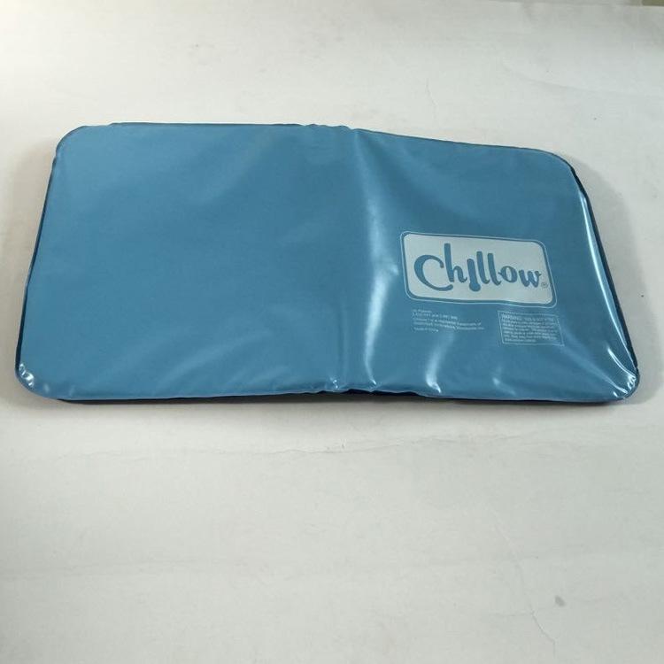 Chillow pad placed under a white pillow on a bed