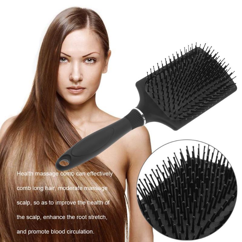 Dense black bristles shown beside long brown hair