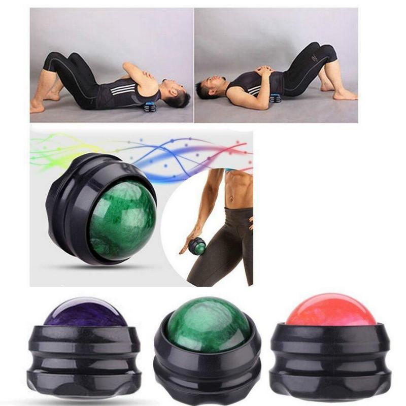 Person lying on back demonstrating massage ball usage on spine and legs during floor exercises