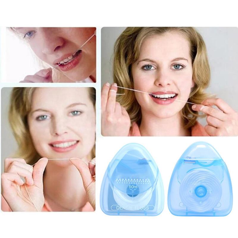 Diverse model smiling confidently after flossing, holding the Channy floss dispenser near her face in a sunlit bathroom