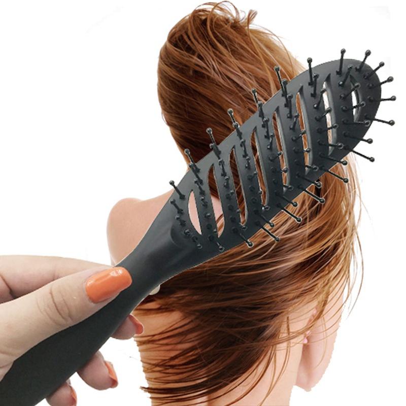 Vented brush gliding through long hair