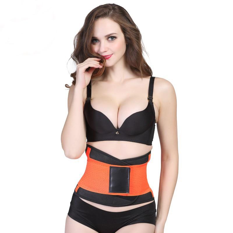 Woman wearing hot pink and black waist shaper belt with confident expression