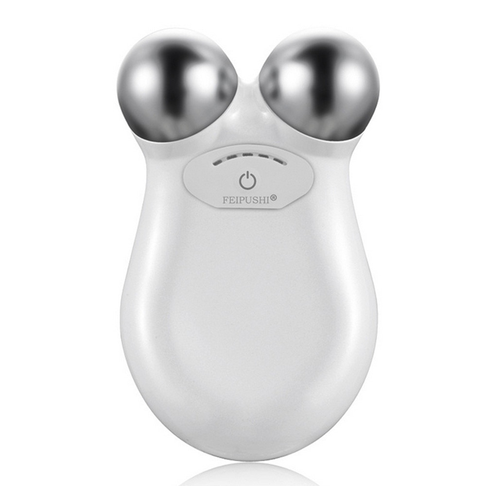Pearl white microcurrent facial massager with dual silver rolling spheres and power button on brushed champagne metal surface