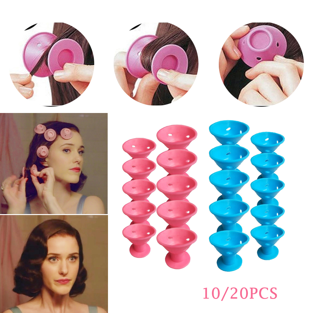 Pink and blue rollers creating curls around hair