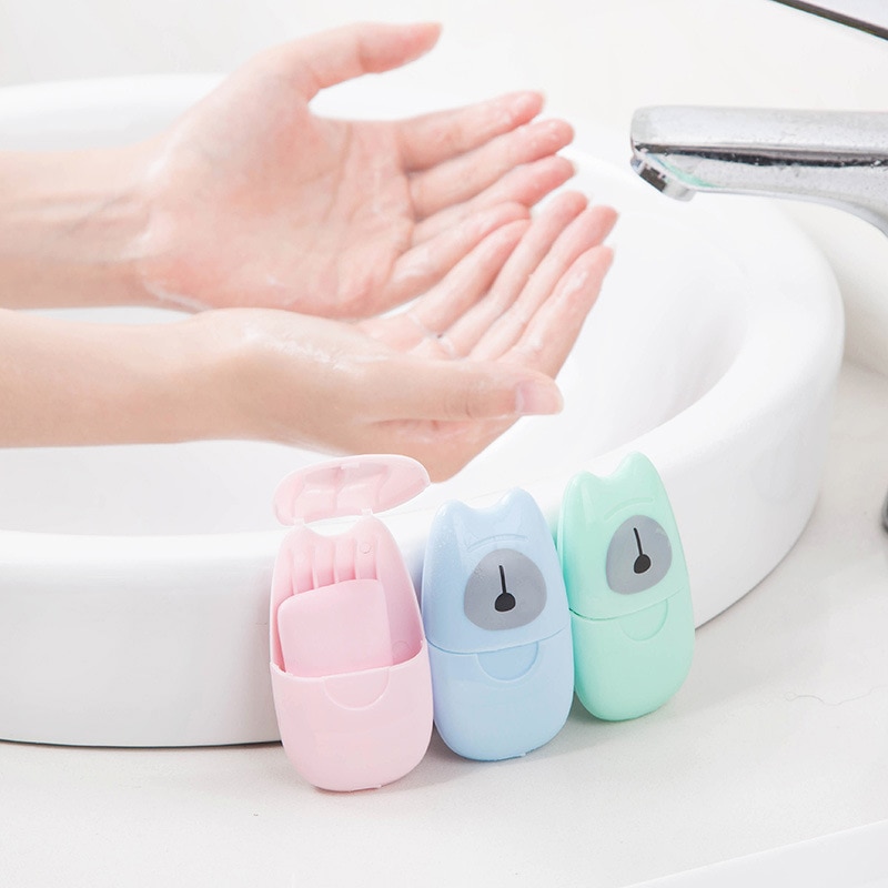Hands washing with soap sheets under running water, lathering instantly