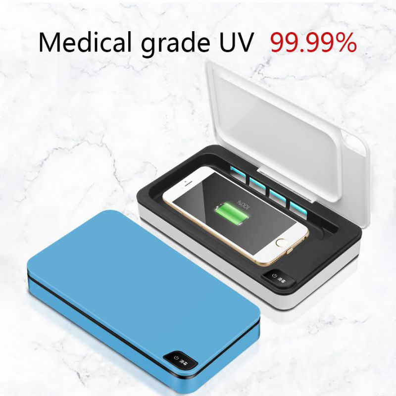 The UV sterilization box with phone inside on a marble surface, showcasing its dual function
