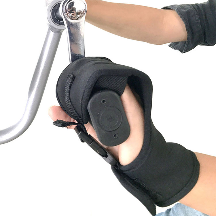 Stroke survivor attempting to hold exercise bike handle without support, showing strain