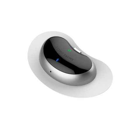 Flat‑lay of all device components: main unit, silicone straps, control panel with electrodes