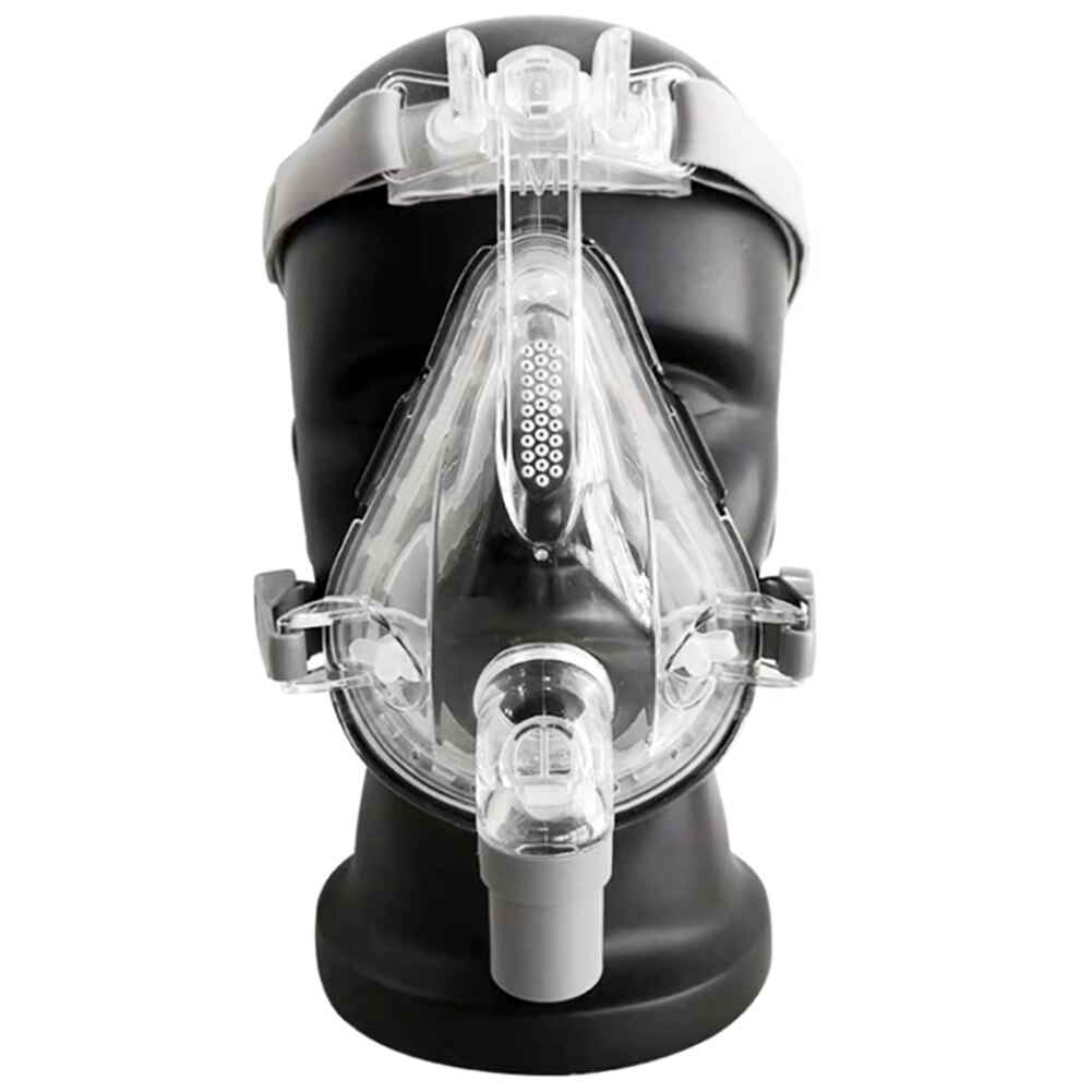 Front view of the mask on a manikin, showing the soft nasal pillows and stable headgear