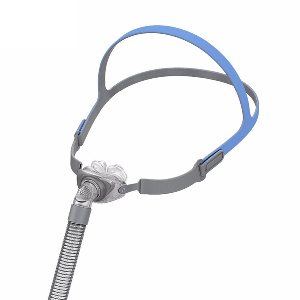 Top view of nasal pillow mask with dual head straps and connector tubing.
