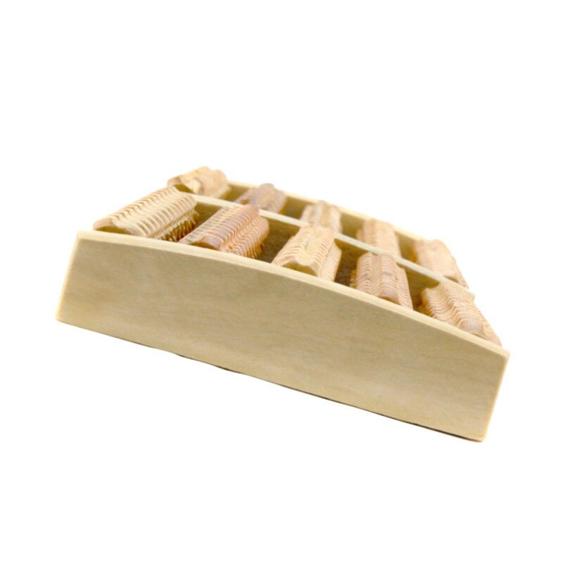 Empty wooden foot massager tray, symbolizing the need for relief after a long day