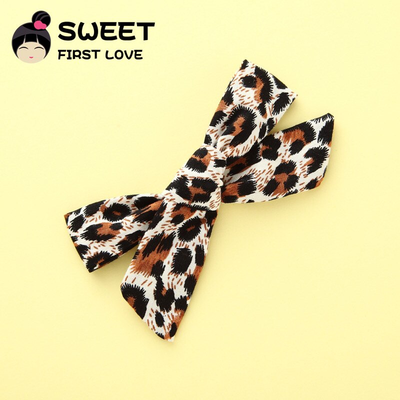 Close view of soft leopard fabric bow shape