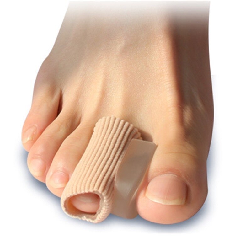 Gel toe cup and fabric band, showcasing the two-part design and medical-grade silicone