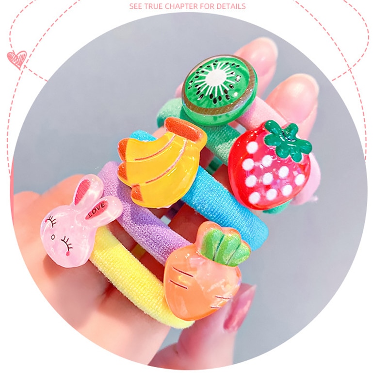 Raised fruit and cartoon details on colorful hair ties