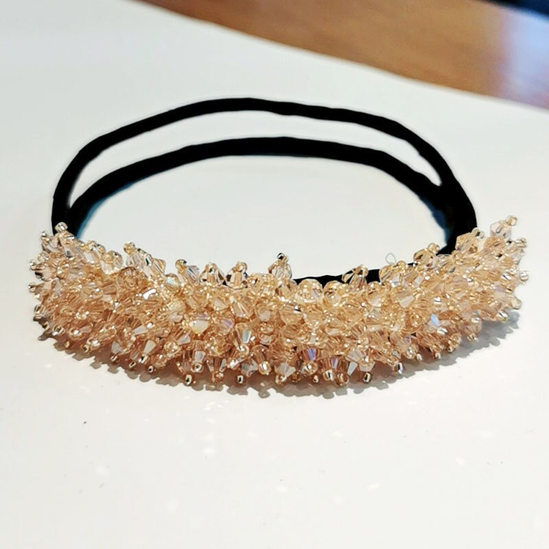 Champagne gold crystal accessory with handmade decorative finish