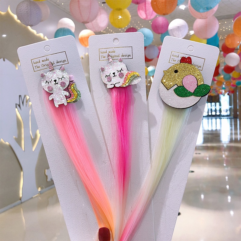Close-up of cartoon hair extensions with glitter