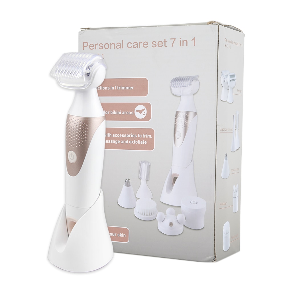 White grooming device with champagne rose textured grip