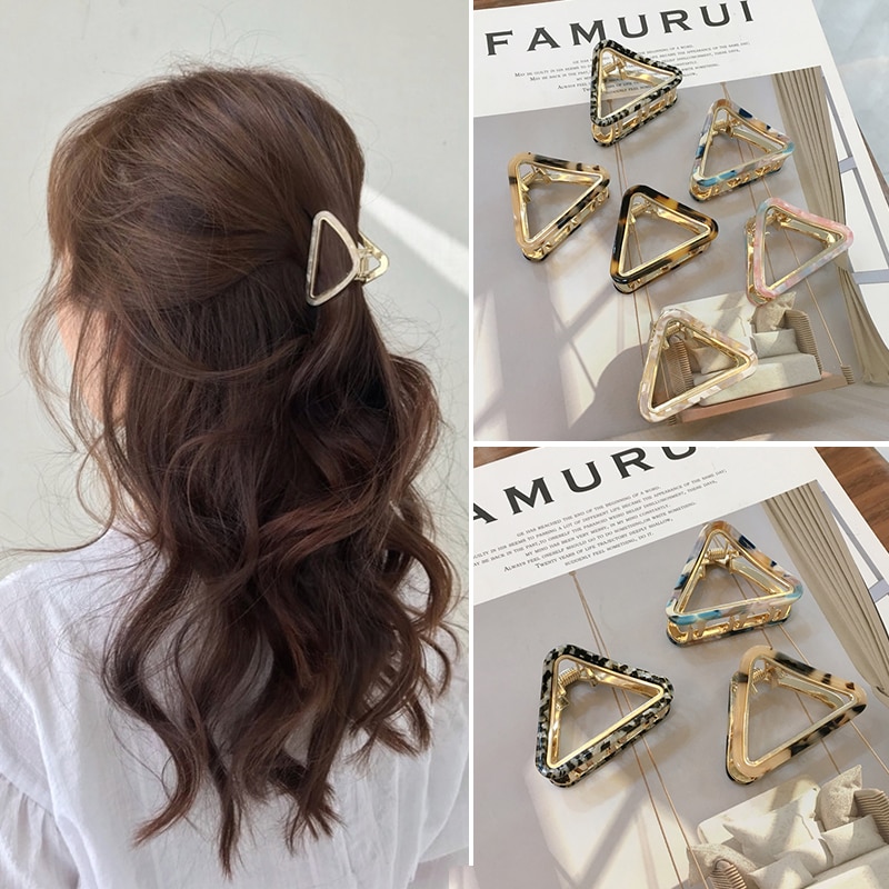 Light metallic clip worn in soft wavy hair