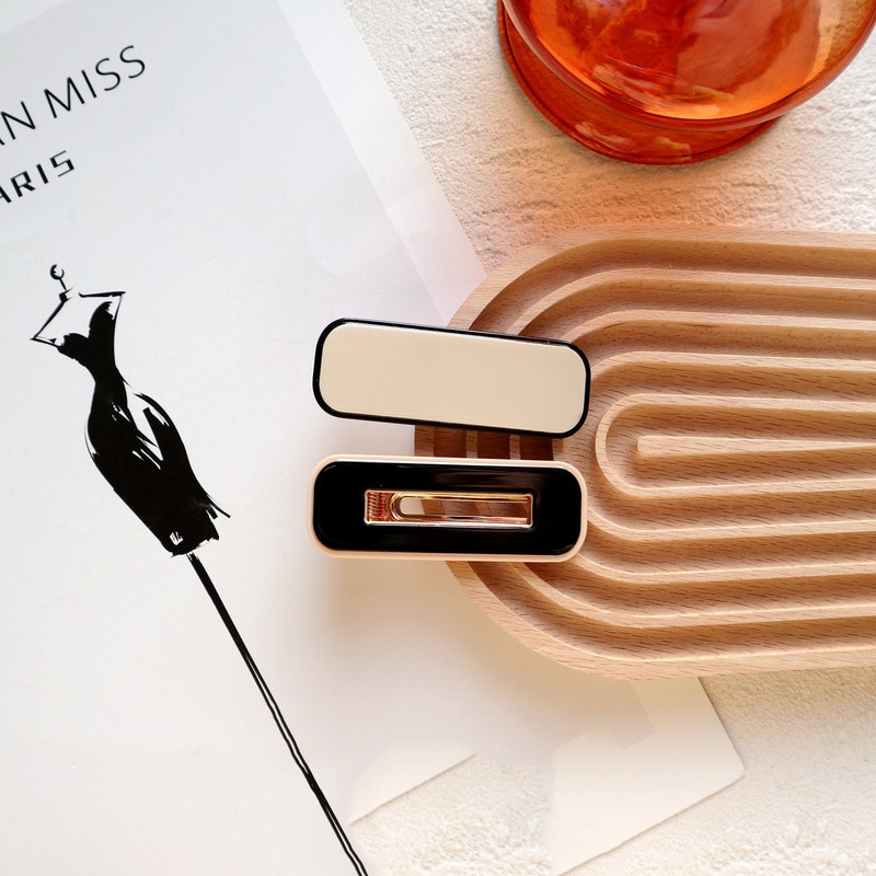 Glossy cream and black slim geometric barrettes