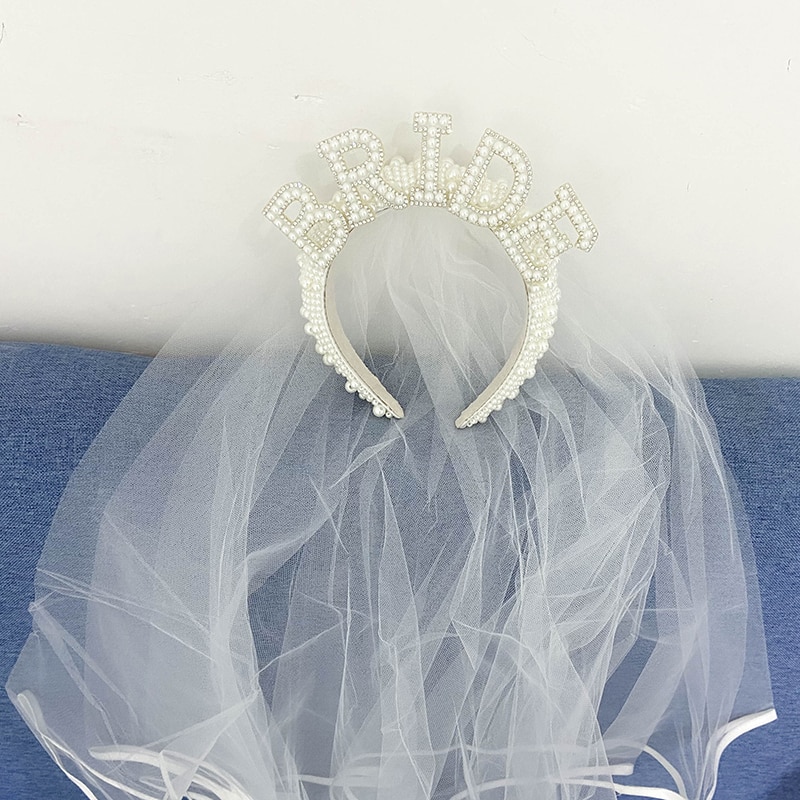 Flowing layered tulle veil with translucent volume