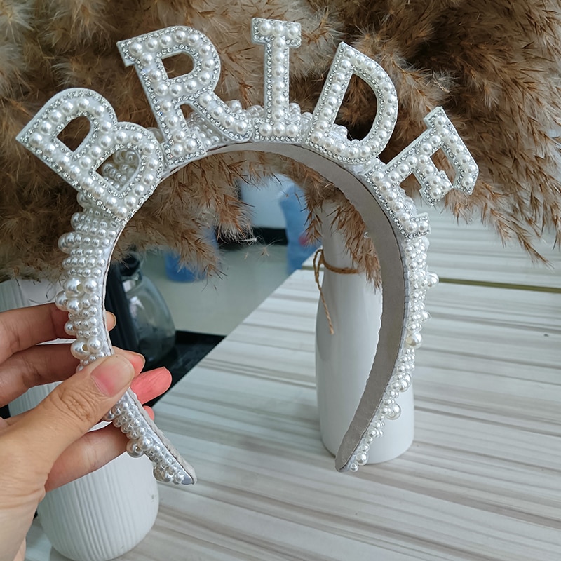 Dense faux pearls and rhinestones on BRIDE crown