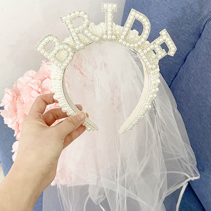 Pearl-encrusted headband with bride lettering