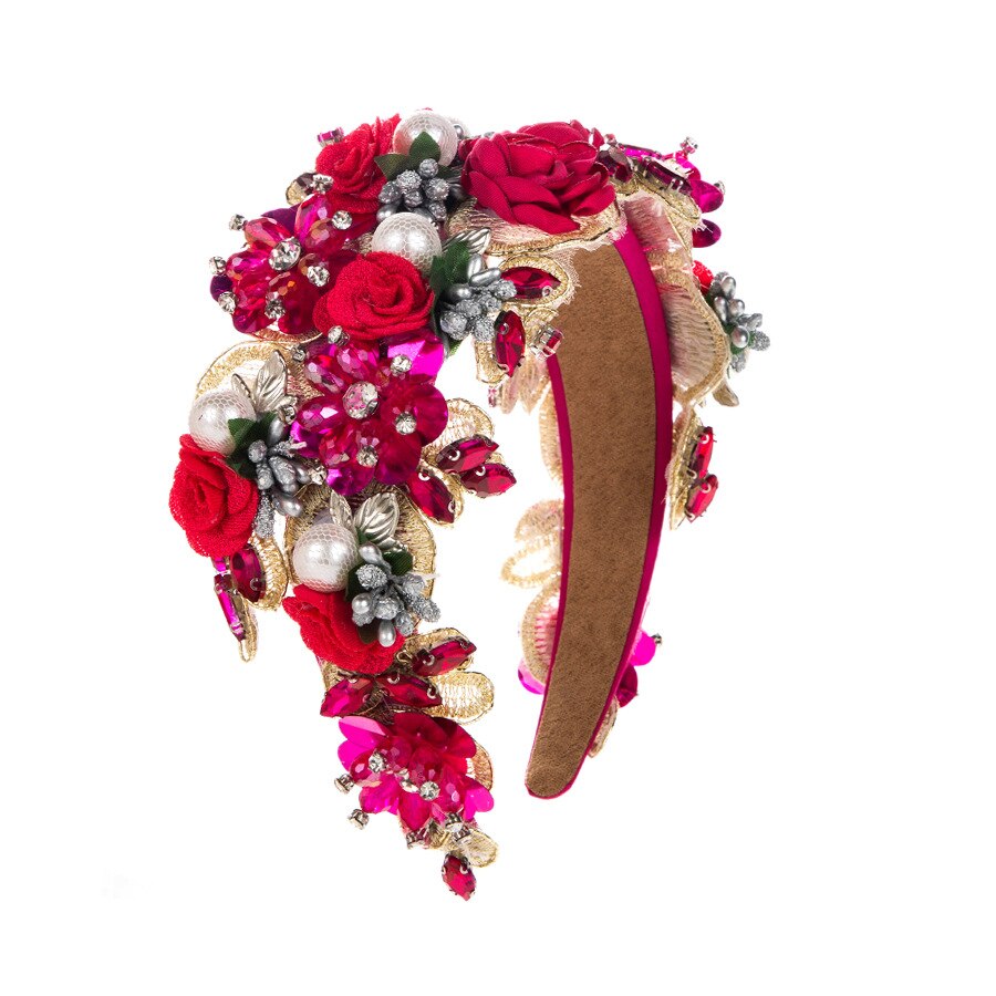 Layered fabric roses create dimensional floral volume