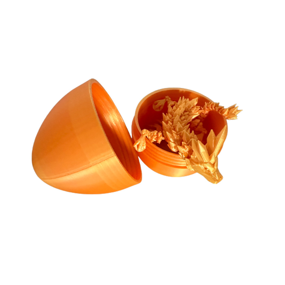 Discover the magic of this 3D Printed Moveable Dragon in Egg, a unique collectible that combines intricate design with fascinating movement. Crafted with precision, this dragon springs to life within its egg, making it a captivating display piece.