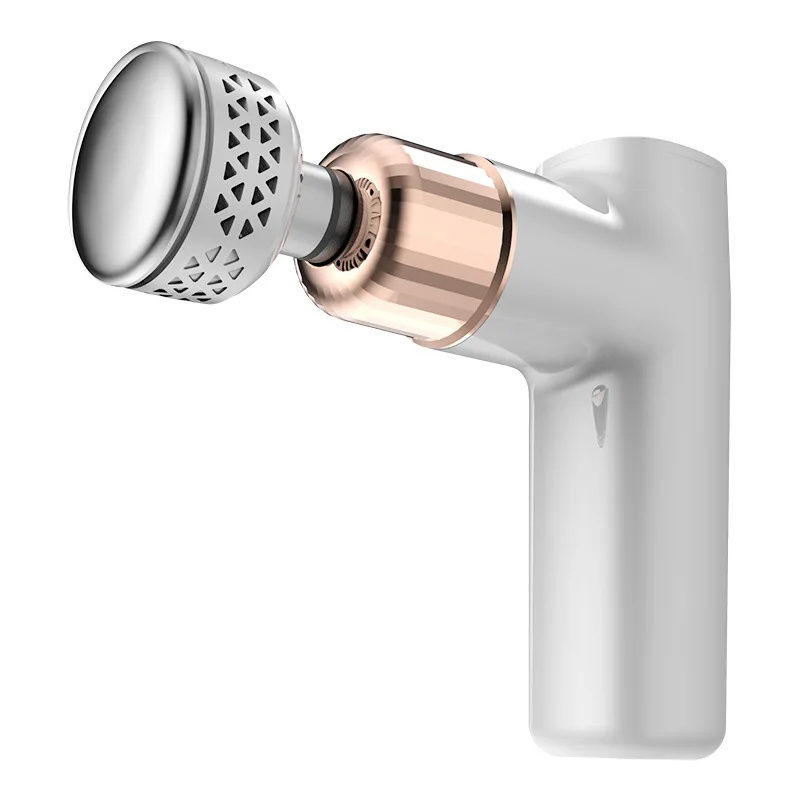 White fascia gun with rose gold accents and interchangeable heads on light background