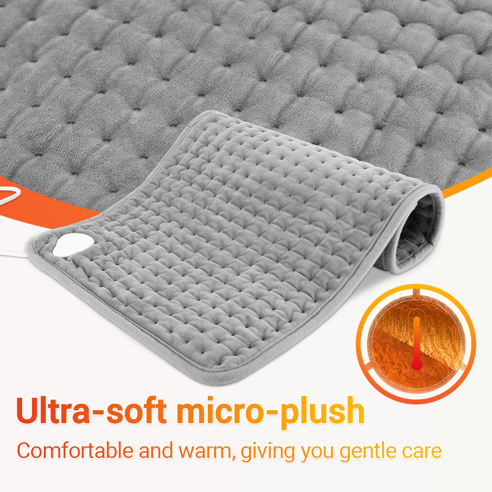 Close-up of the quilted heating surface showing the therapeutic grid and soft micro-plush, conveying advanced temperature control