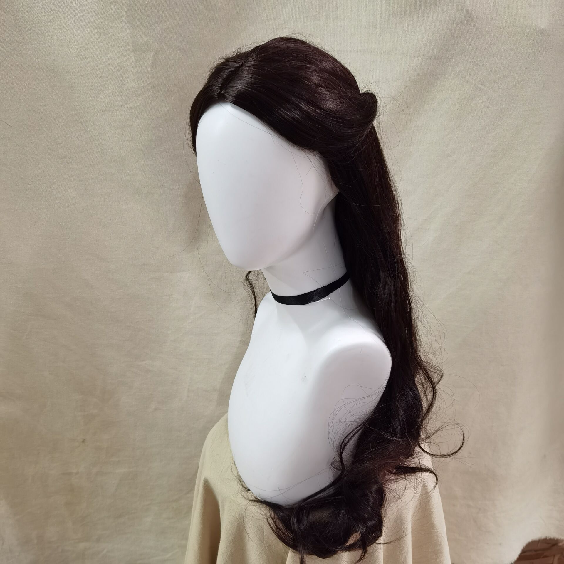 Long side profile of dark brown wavy wig