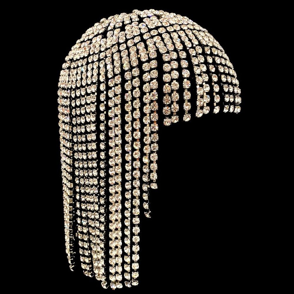 Side view of layered rhinestone chains and tassels